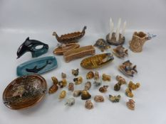 Selection of Wade Whimsies and larger Wade figures along with Poole pottery dolphin and small