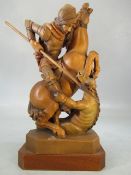 Good carved wooden figure (poss Austrian) of George and the Dragon.