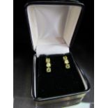 9ct three green stone set earrings