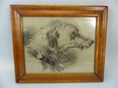 Small charcoal drawing of a dog signed lower left in a burr maple frame