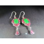 Silver pair of enamel set earrings, in the abstract design.