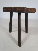 Small antique milking stool