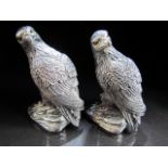 Silverplated pair of condiments in the form of eagles.