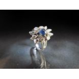 18ct Gold Sapphire and Diamond cluster ring. Approx weight - 5g UK - M