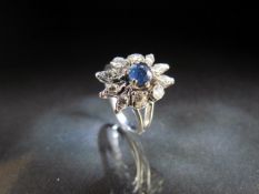 18ct Gold Sapphire and Diamond cluster ring. Approx weight - 5g UK - M