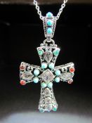 Silver Crucifix on chain set with turquoise and other coloured stones