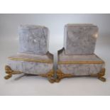 Pair of marble plinths with gilt feet