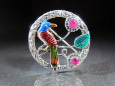 Silver and Enamel circular pendant set with enamel and semi precious stones