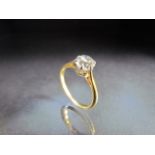 Ladies Solitaire Diamond ring. 18ct hallmarked yellow gold ring with Platinum setting and a fine,