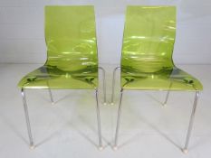 Two Italian Designer style green clear seated chairs