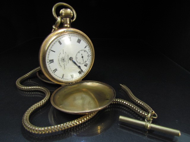 Gold plated pocket watch by Thos Russell & Son Liverpool. With plated Albert