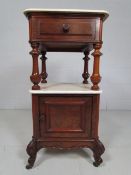 Early Mahogany two tier marble topped wash stand on castors