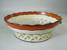 Staffordshire 18th century creamware lattice basket with ochre coloured top.