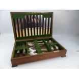 Harrods Ltd Oak cased canteen of silverplated cutlery. 6 Piece setting.