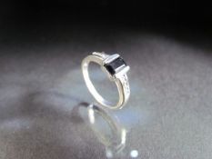 18ct White gold ring set with Onyx stone and with four Diamonds to each shoulder