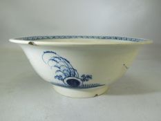 Pearlware bowl of large form painted in Underglaze blue with fence pattern rim. Decorated to outside