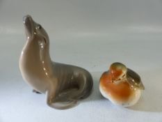 Copenhagen figure of a seal and a similar figure robin