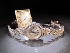 Swiss Empress marcasite set cocktail watch along with a Pierre Main watch face