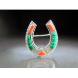 Malachite and Coral set brooch in the form of a horseshoe