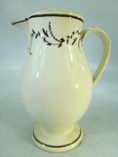 18th Century Staffordshire creamware jug of tall form. Brown banding to rim and foot. With simple