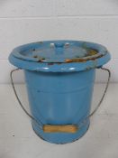 Unusual blue enamlled milk pot and cover with wooden handle. unmarked.