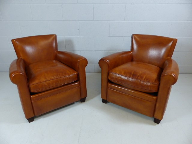 Brand New Tobacco coloured leather armchairs