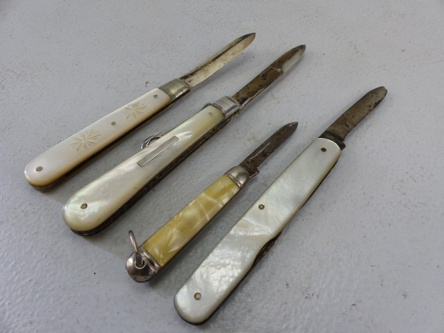 Four mother of pearl Fruit Knives - two with silver blades