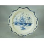 Pearlware Liverpool blue and white plate depicting pagoda scenes with swag edging