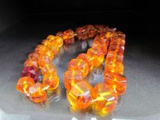 Baltic Amber necklace with graduated facet cut beads. approx 71.6g