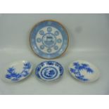 Chinese Imperial earthenware plate decorated in blue and white glaze with ochre rim. Along with