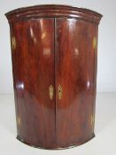 Georgian Mahogany bow fronted corner cabinet