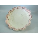 19th century creamware bowl of floral form. The surround of the bowl decorated with pink floral