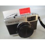 Olympus Trip 35 vintage camera and manual