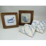 Two framed Delft antique tiles along with two others unframed