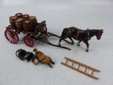 Britons lead model of a horse and cart with beer barrells