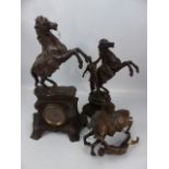 Bronzed French mantle clock with Marly style matching rearing horse garniture