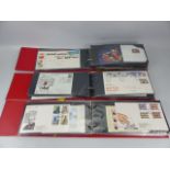 Large selection of First Day covers in three albums