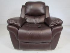 Brown leather electric recliner chair (paper and remote in office)