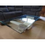 Composite modern coffee table with glass top