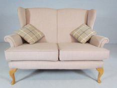 Parker Knoll style newly upholstered two seater settee on cabriole feet
