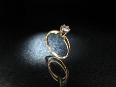 Yellow Gold 14K ring set with approx 0.25pts diamond.