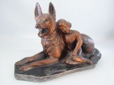 Bronzed coloured figure of an Alsatian and a child signed Fedelpa