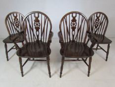 Set of four oak wheelback chairs