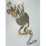 Chinese Metal filigree work dreamcatcher necklace, set with pendant fish and amber beads. Hammered