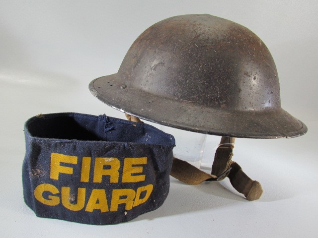 WW2 Military Helmet (Dated to the inside) and a Fire Guard Arm band