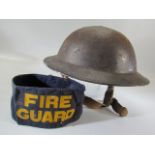 WW2 Military Helmet (Dated to the inside) and a Fire Guard Arm band