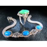 925 Turqouise cabochon set bracelet marked silver and a jade set ring