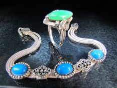 925 Turqouise cabochon set bracelet marked silver and a jade set ring