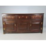 19th Century long oak Sideboard. Simplistic features of three drawers over three cupboards. Each