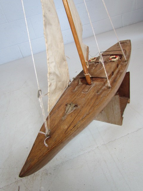 Handmade wooden racing boat with sails on stand - Image 2 of 3